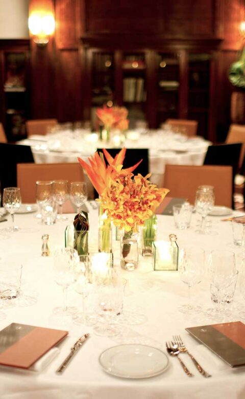 two large round tables set up for dinner