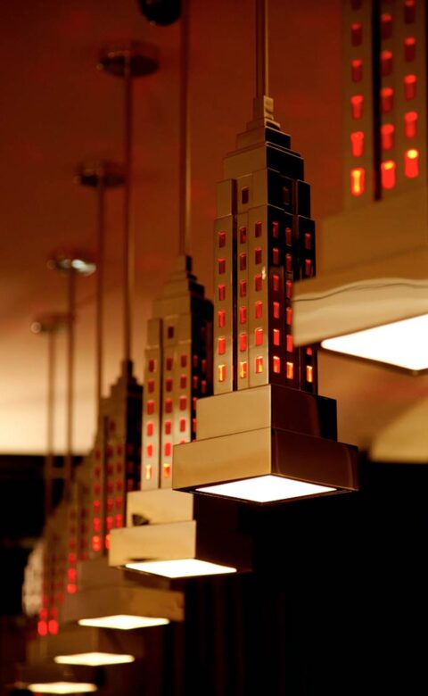 Hanging light fixtures in the shape of the Empire State Building